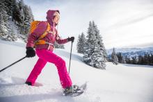 A woman snowshoeing in Colorado